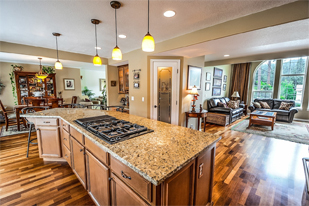 High-end finishes for kitchen and bathrooms utilize premium materials and custom designs.