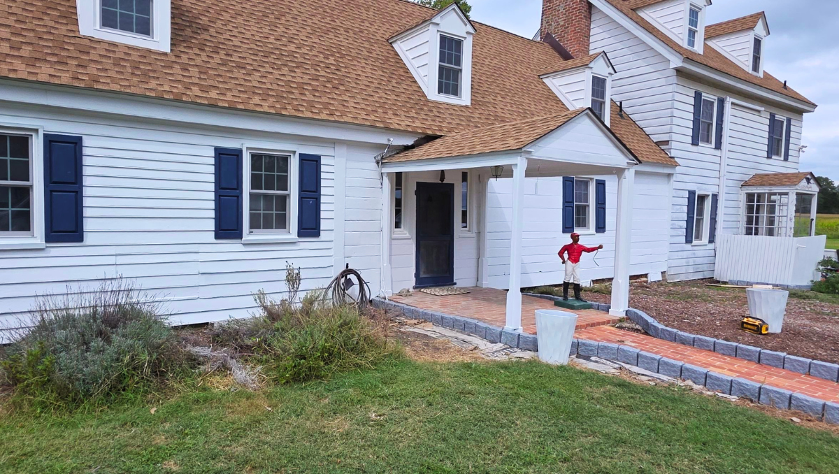 Fully restored historic Anderton Property home exterior in Oxford Maryland with fresh paint and preserved architectural details