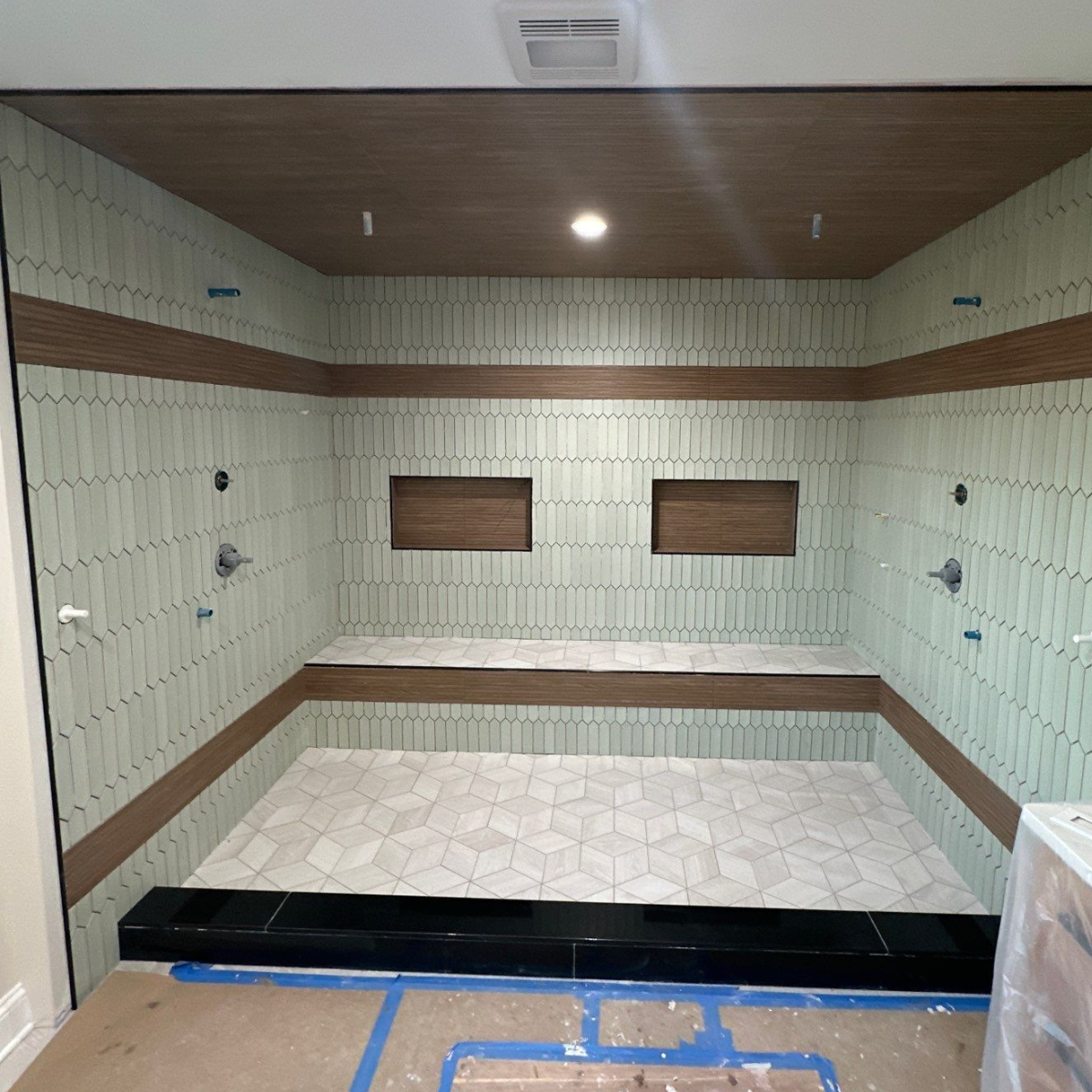 Bathroom remodel in progress on the Eastern Shore MD showing custom tile shower installation and construction work