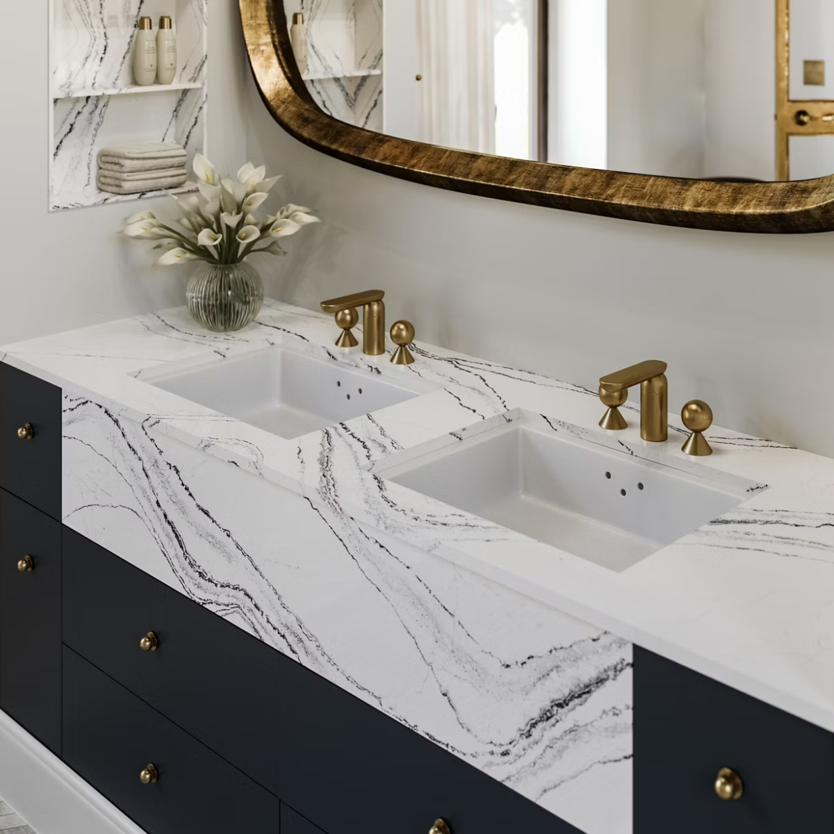 Double sink bathroom vanity with marble countertop and brass fixtures in a custom remodel design