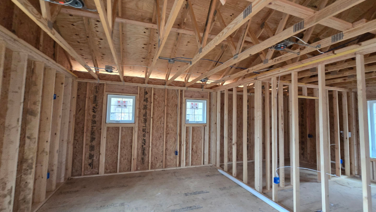 Interior framing and room layout inside custom garage apartment during construction in Royal Oak Maryland