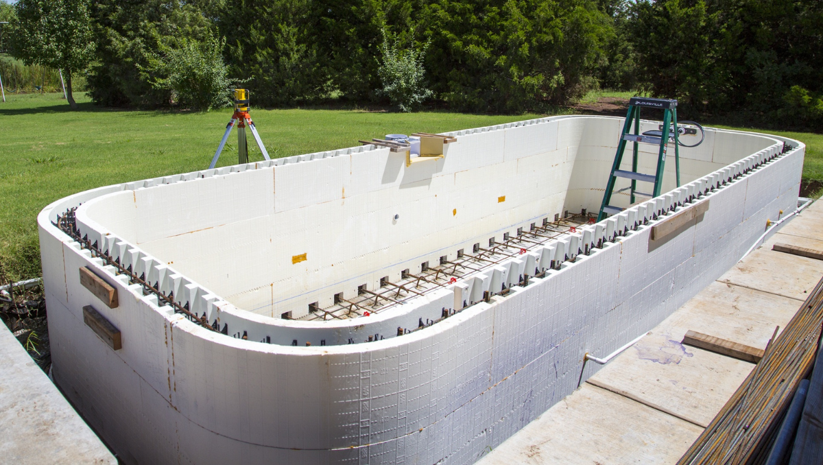 Insulated concrete form walls installed for custom swimming pool construction project