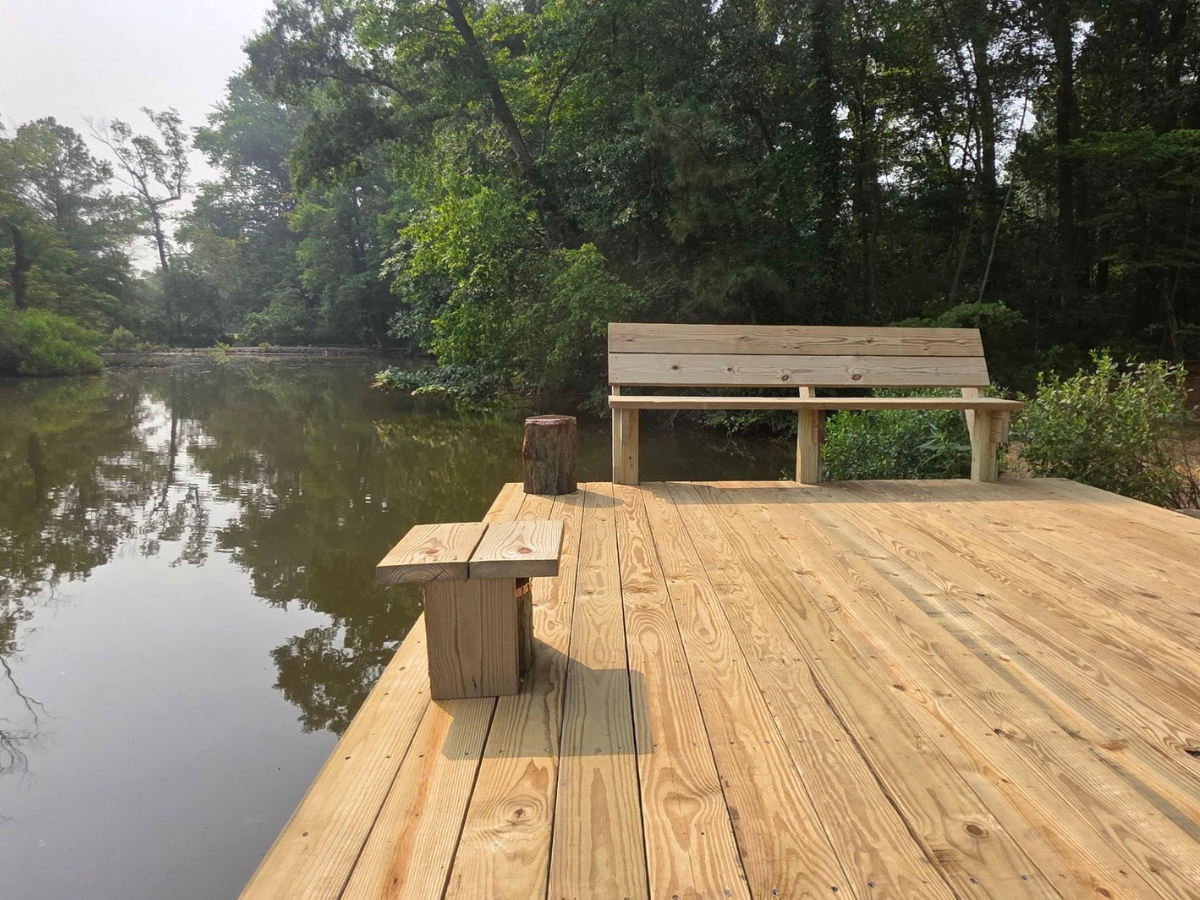 Newly rebuilt dock with custom wooden bench overlooking Edmonson Creek in Preston, Maryland.