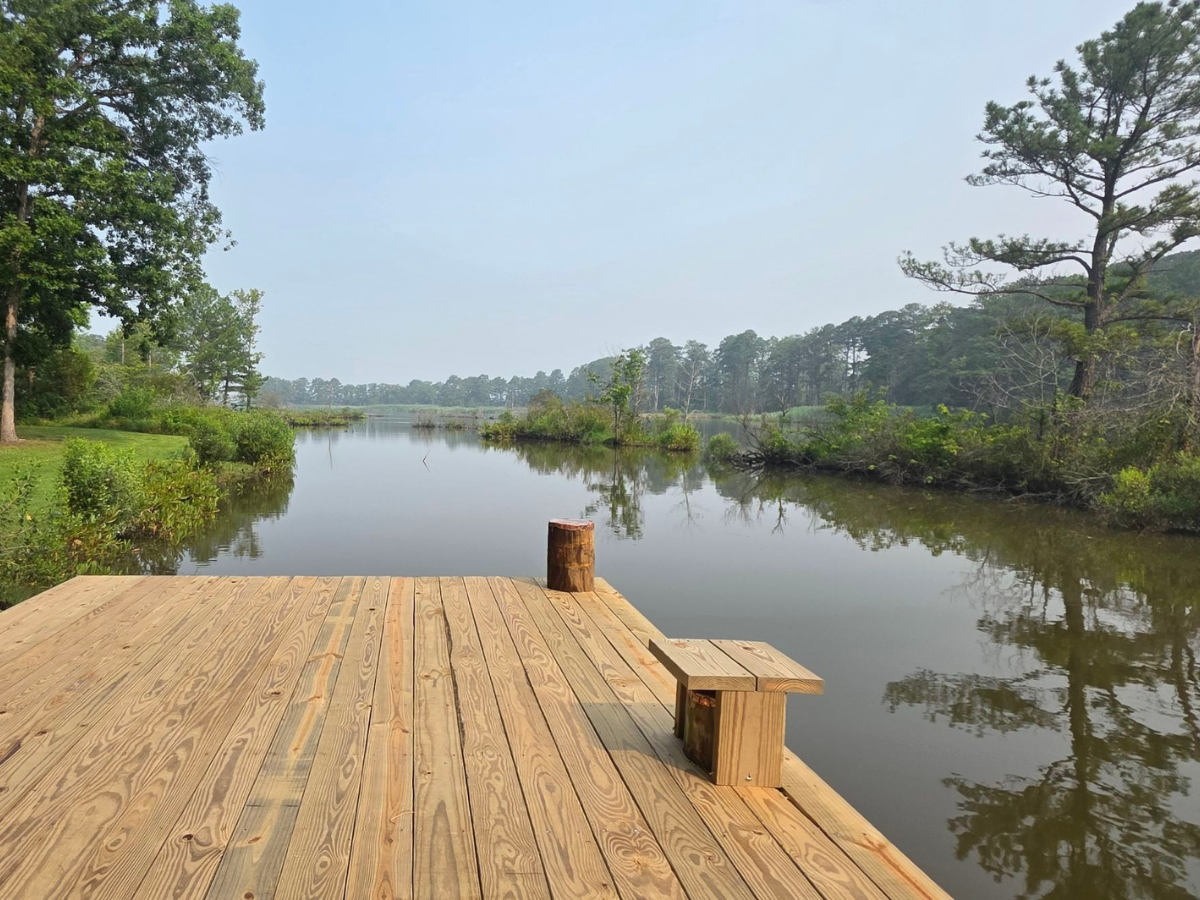 View from the rebuilt dock across the calm waters of Edmonson Creek in Preston.