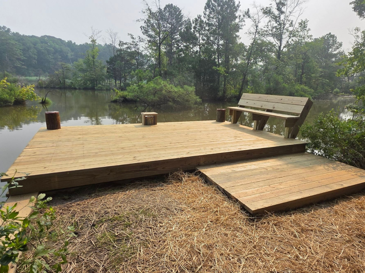 Completed dock rebuild in Edmonson Creek featuring a custom waterfront deck with built-in bench seating by BCO Construction in Preston, Maryland.